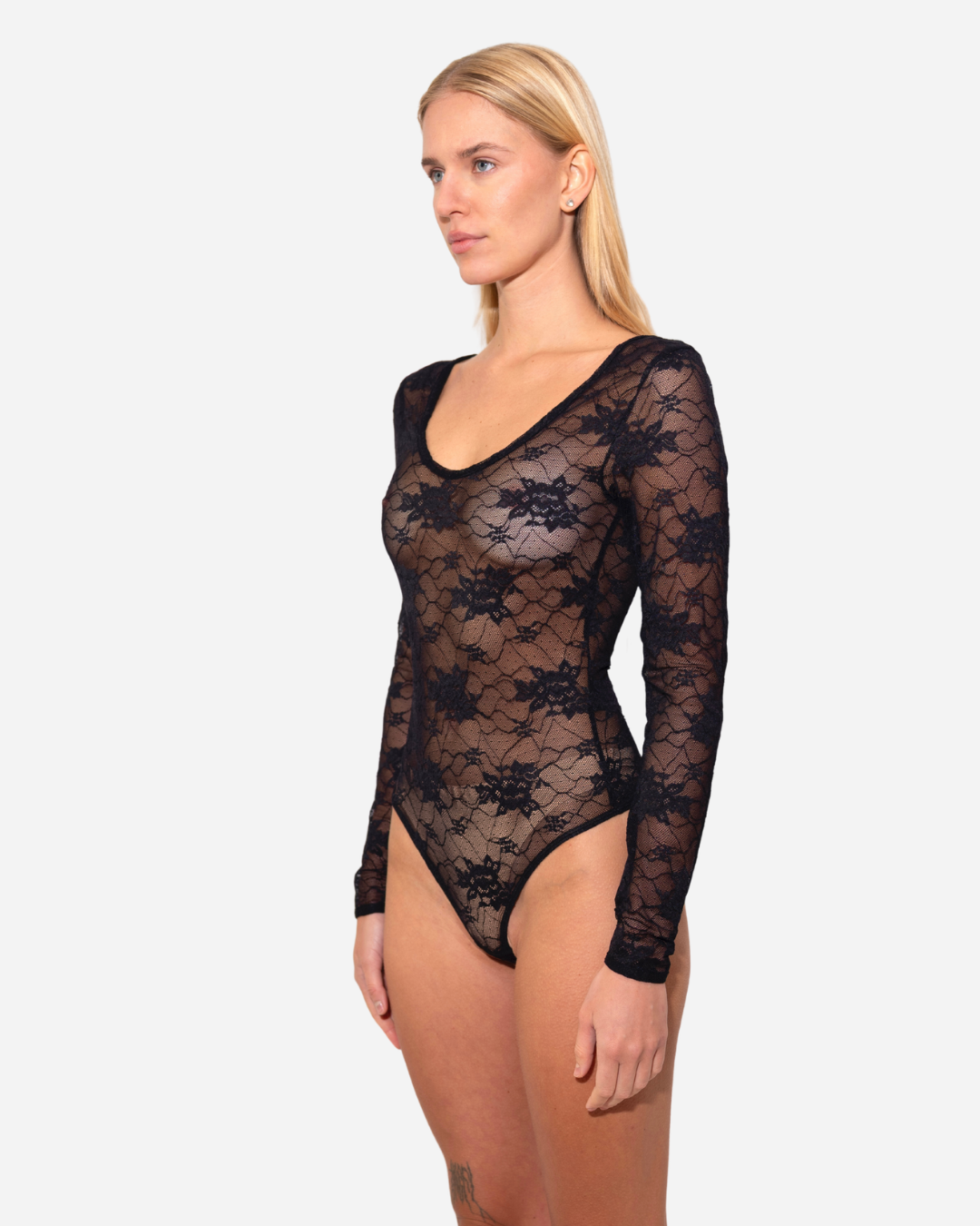 Muse. Black lace transparent bodysuit