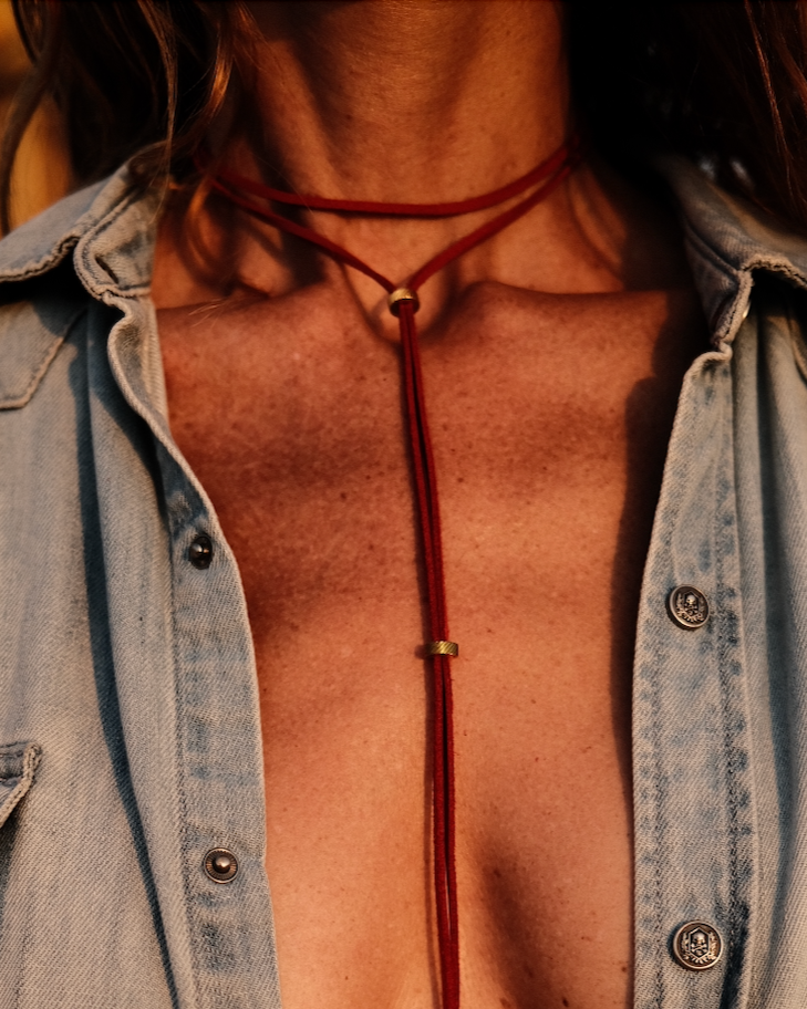 Carmine vegan leather link, enhanced with stainless steel beads. Fiery, assertive, hypnotic.